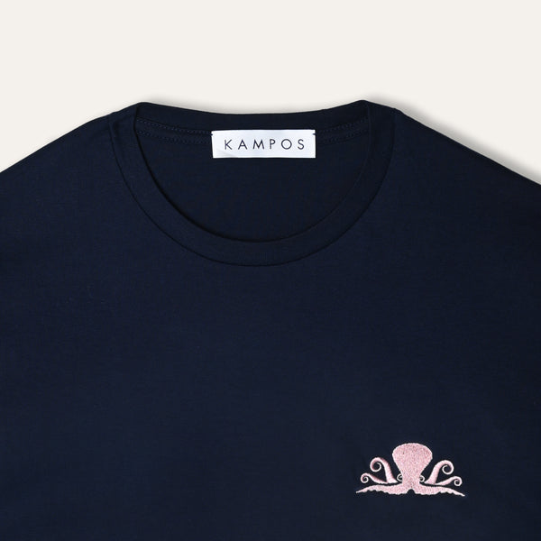 Close-up of the pale pink and white octopus motif on the KAMPOS navy T-shirt